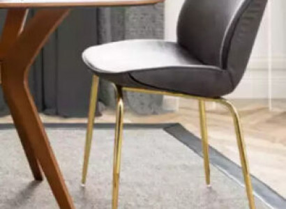 An incomparable chair made of high-quality material and stainless steel for the dining room.